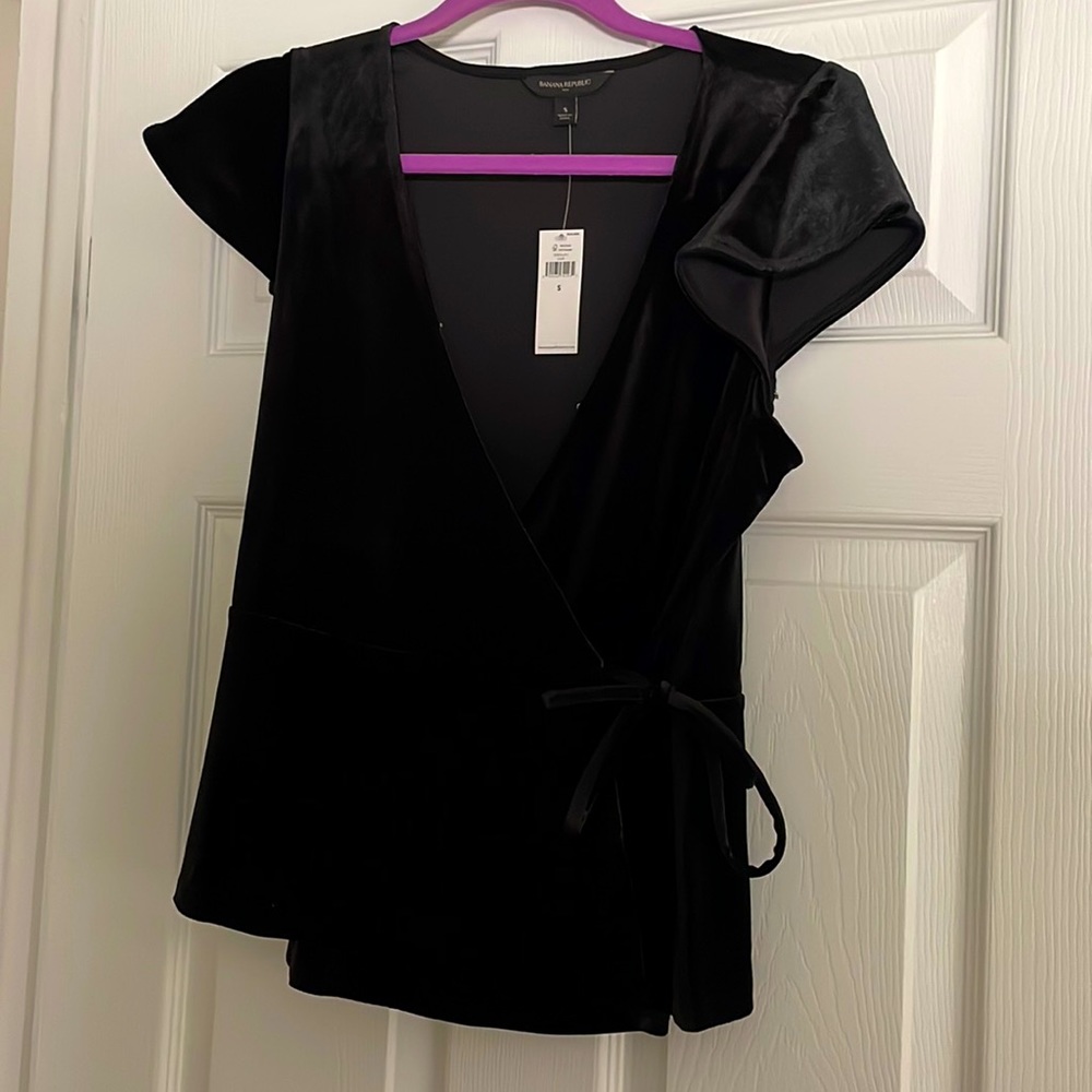 New with tags! Black velvet wrap flutter sleeve top
